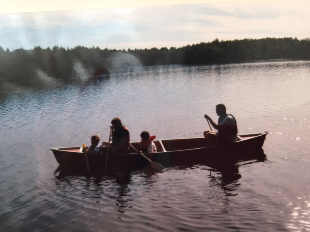 Laura canoeing with her family